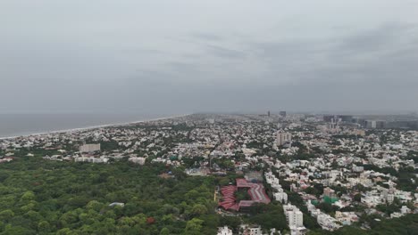 drone view of lush greenery surrounding besant nagar residential zone