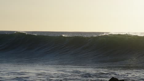 beautiful slow motion slo mo ocean waves crashing and breaking off the sea shore in hawaii