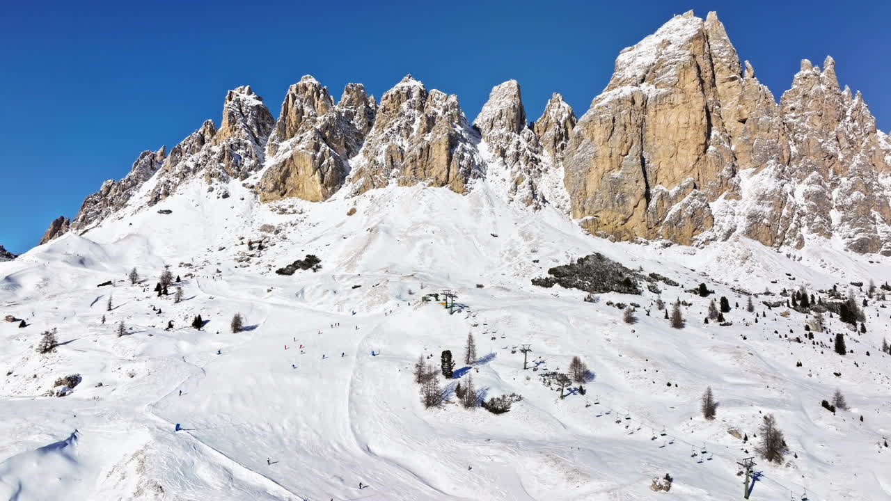 Aerial drone view of the Gardena Pass high mountain pass in the Dolomites, Italy