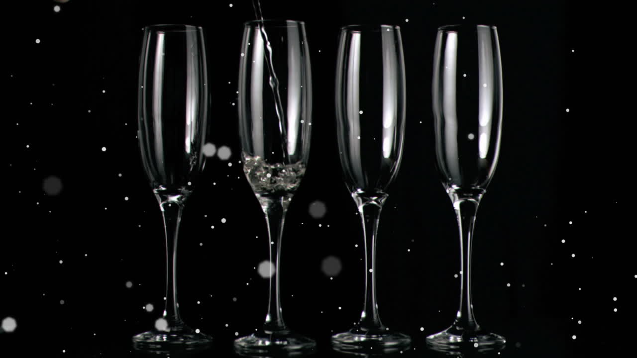 검은 바탕에 있는  ⁇ 페인 잔 위에 떠다니는  ⁇  반점들의 애니메이션