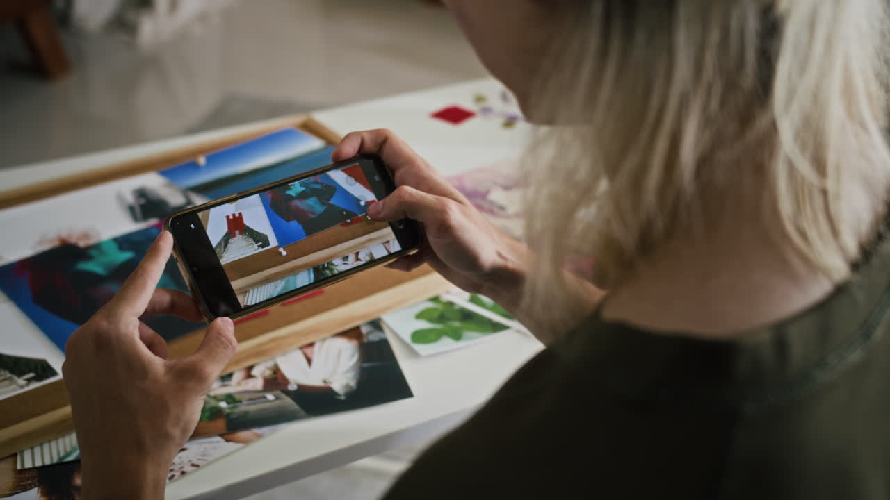 Influencer Taking Video on Fashion Mood Board on Phone