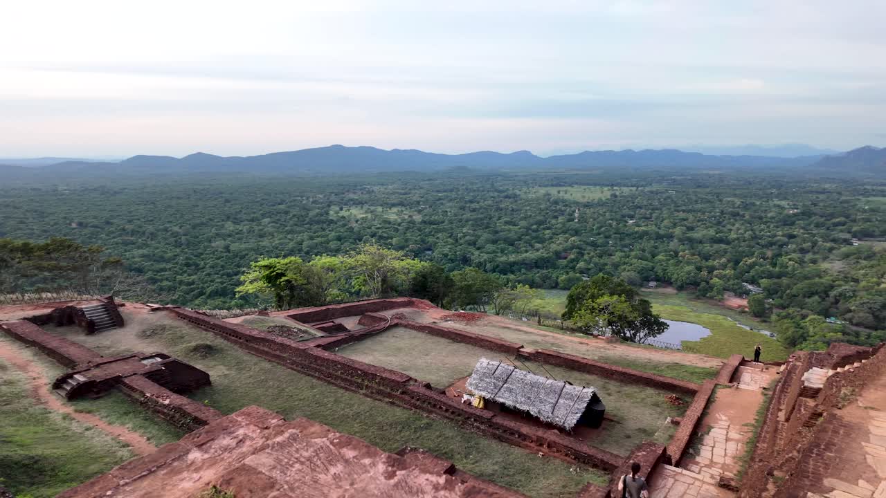Explore the breathtaking terraced gardens at Sigiriya Rock in Sri Lanka. This historic site offers stunning views of lush landscapes and ancient architecture