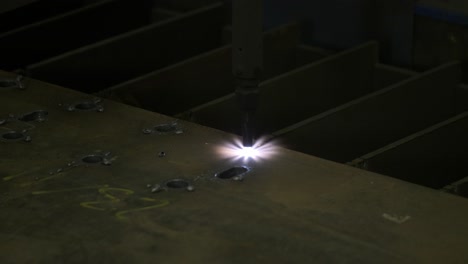 laser precision unfolds: witness seamless cutting of sheet metal in this dynamic stock footage, a dance of light and precision