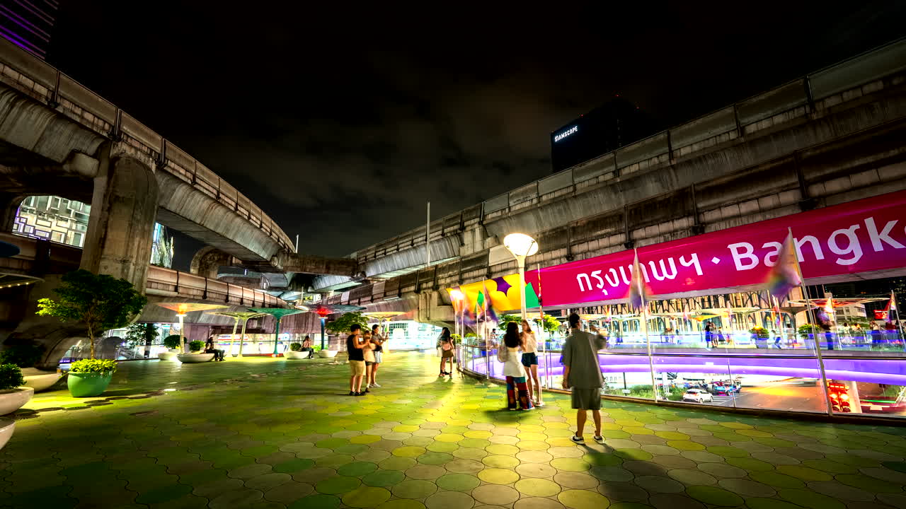 Bangkok Nightlife: Vibrant Cityscape at Elevated Train Overpass