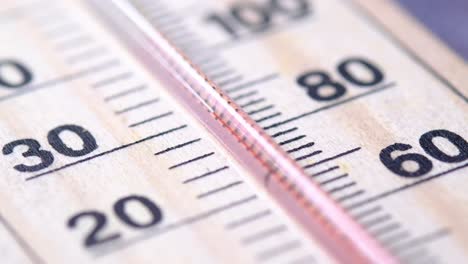 close-up of a wooden thermometer