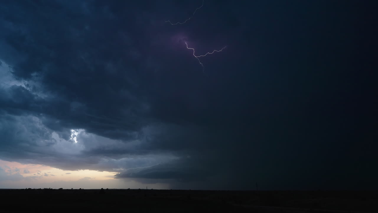 Brilliant Lightning Flashes Reveal Textured Sky and Heavy Rain Curtain