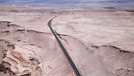 Aerial-View-of-Highway-to-San-Pedro-de-Atacama-Near-Moon-Valley-in-the-Atacama-Desert,-North-Chile,-South-America-Vast-Open-Nature