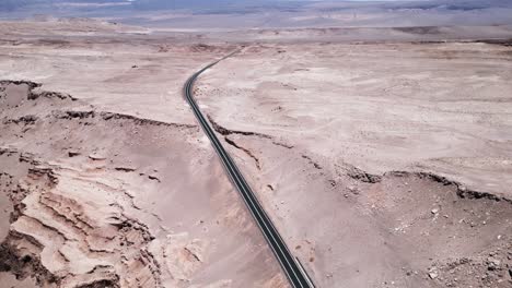 aerial view of highway to san pedro de atacama near moon valley in the atacama desert, north chile, south america vast open nature