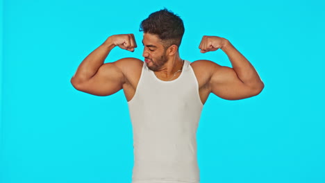 Fitness,-blue-screen-and-man-flexing-muscle