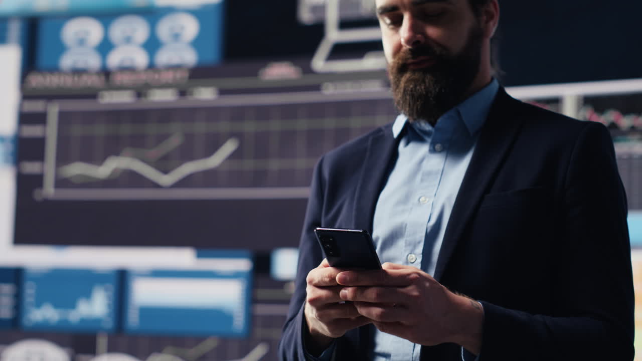 Business entrepreneur sending a text message with analytics reports