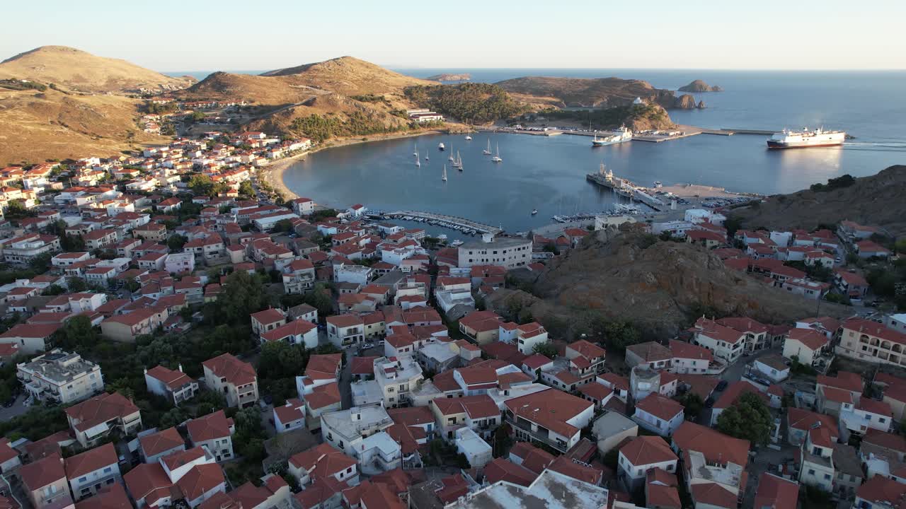Myrina Limnos Aerial Dolly Panoramic View of City Center and Ferry Arriving at Port
