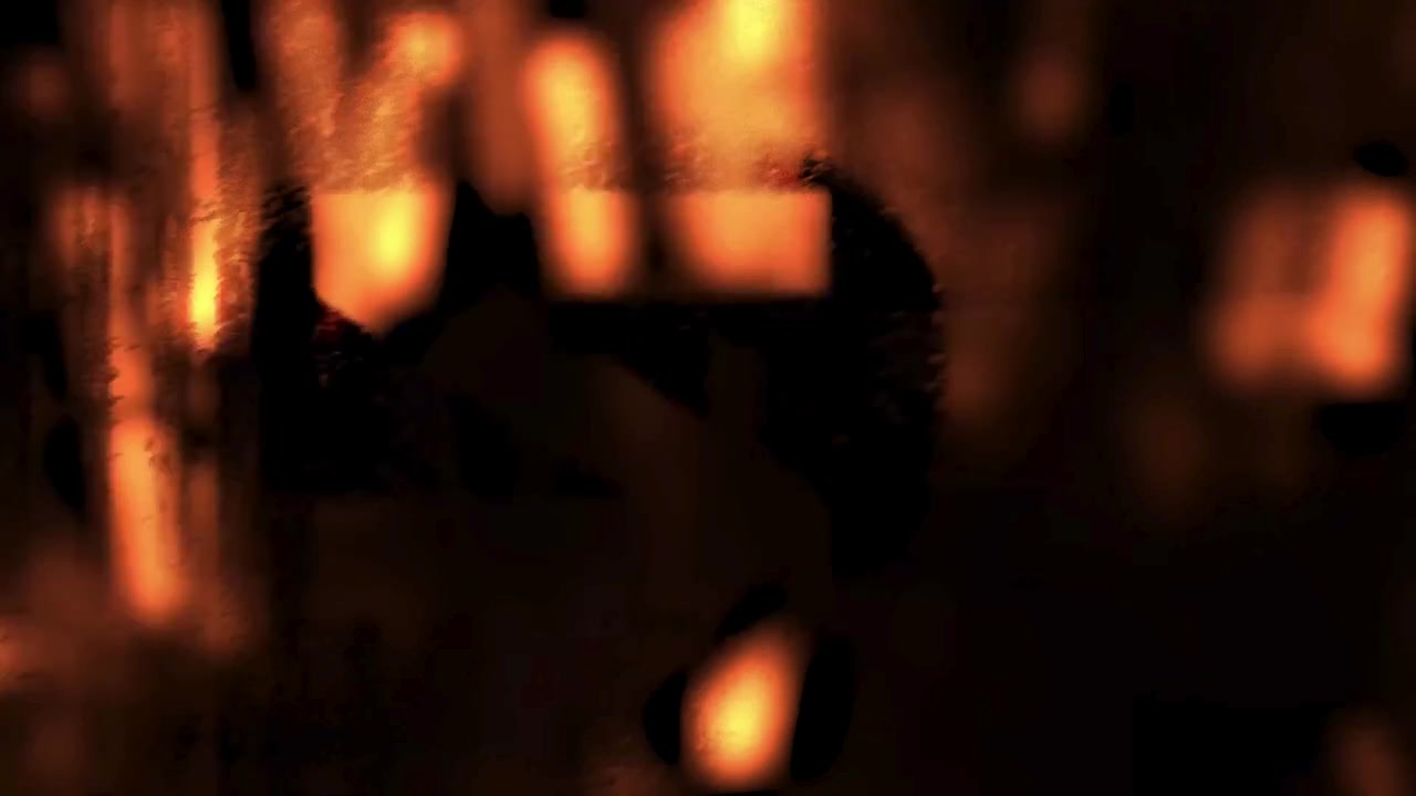Abstract Red Light Streaks and Bokeh Effects on Black Background