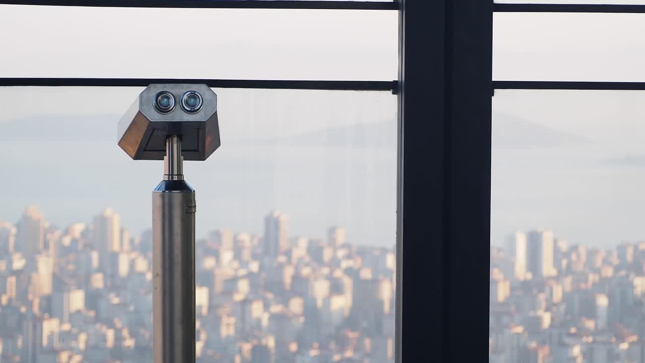 Binoculars Overlooking a Cityscape
