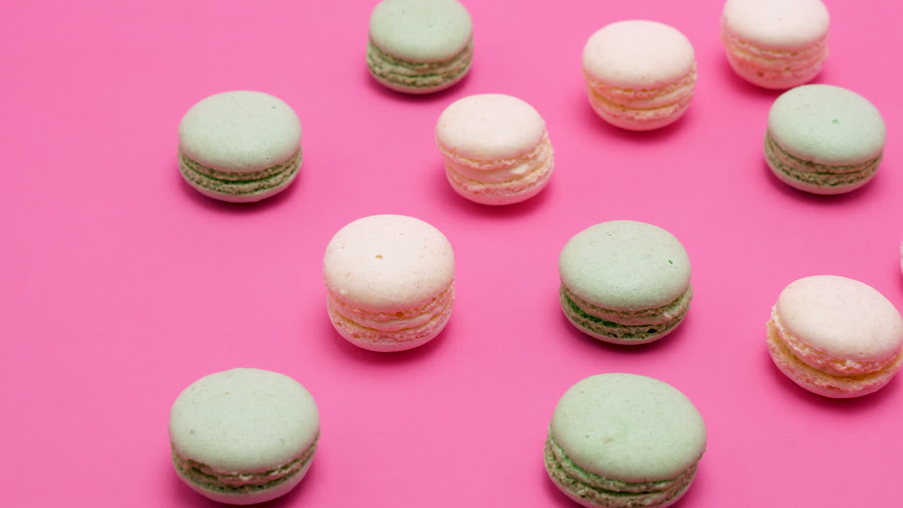Macarons on a pink background