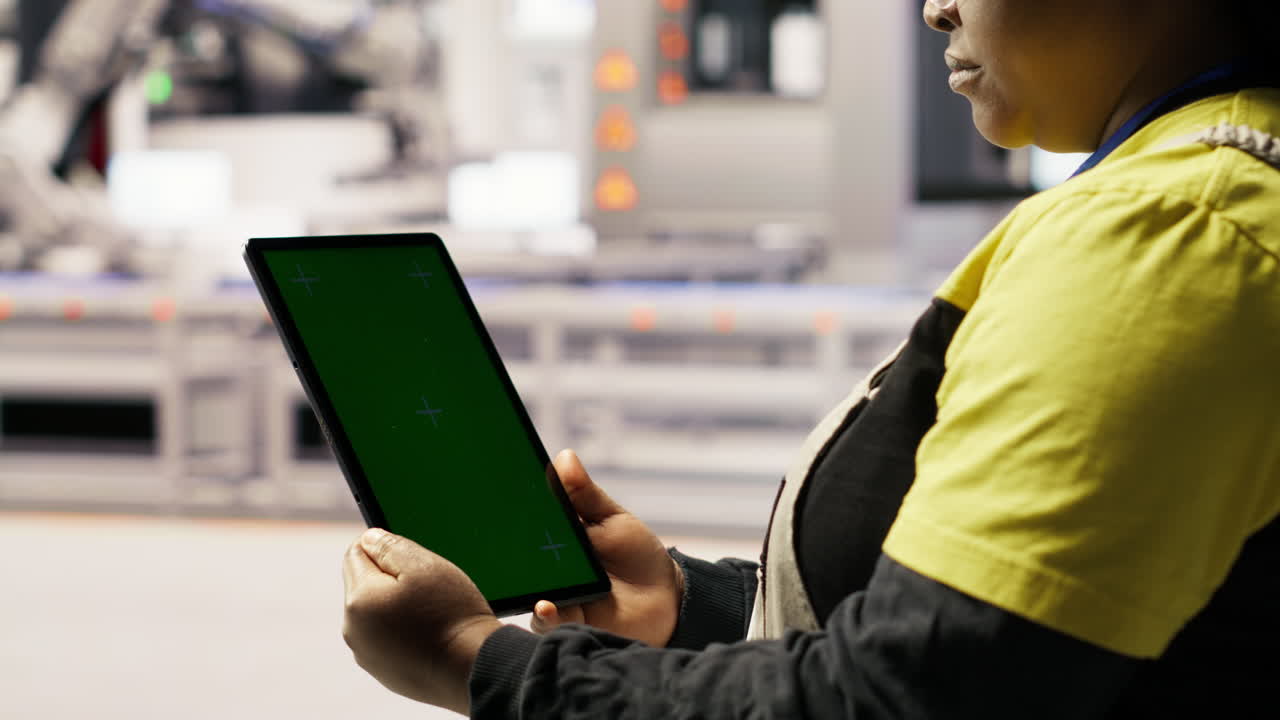 Close up of mockup tablet used by engineer in factory to perform maintenance