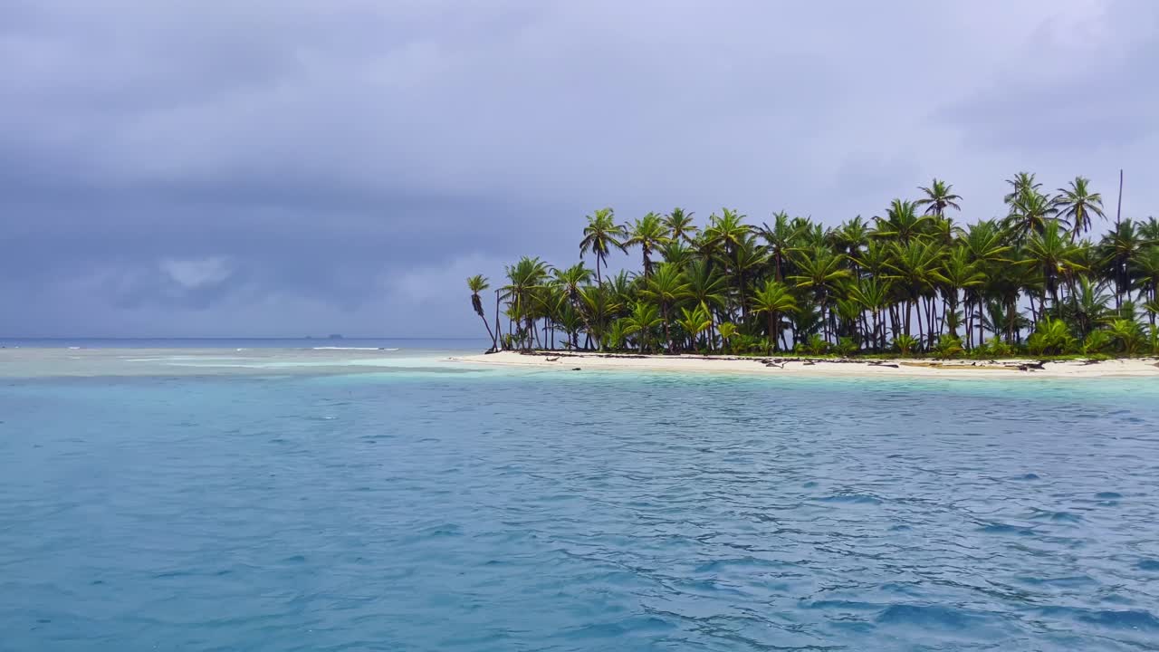 passing island with a storm blowing in, San Blas Islands, Panama. UHD