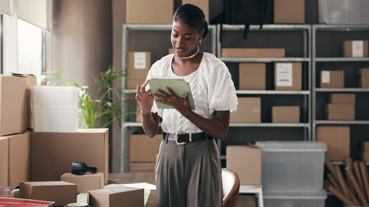Happy Young Black Woman Managing Online Business with Tablet