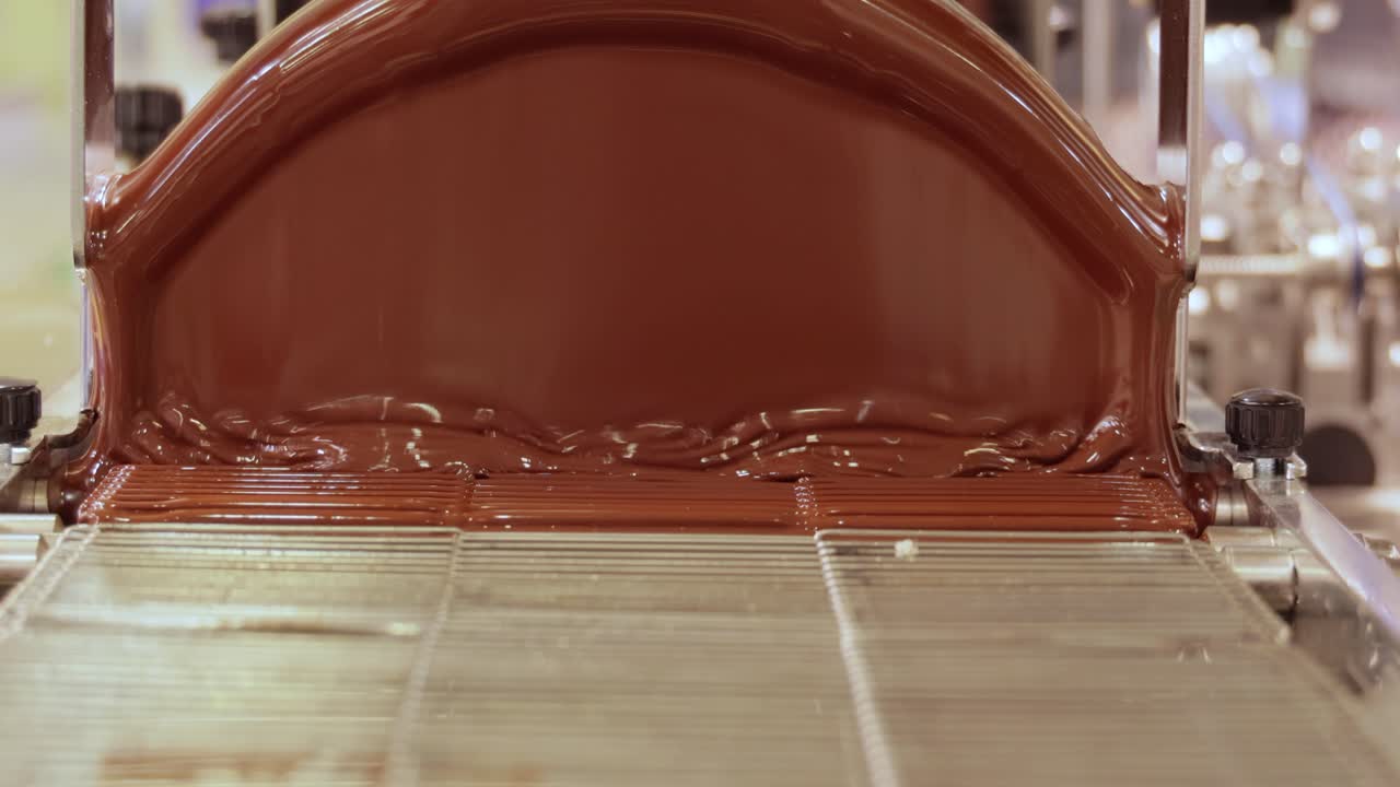 producción de productos de chocolate, máquina para mezclar chocolate.