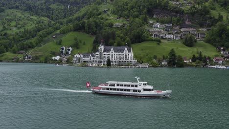 Ferry-Boat-on-Lake-Lucerne-in-Swiss-Alps,-Switzerland---Aerial-Drone