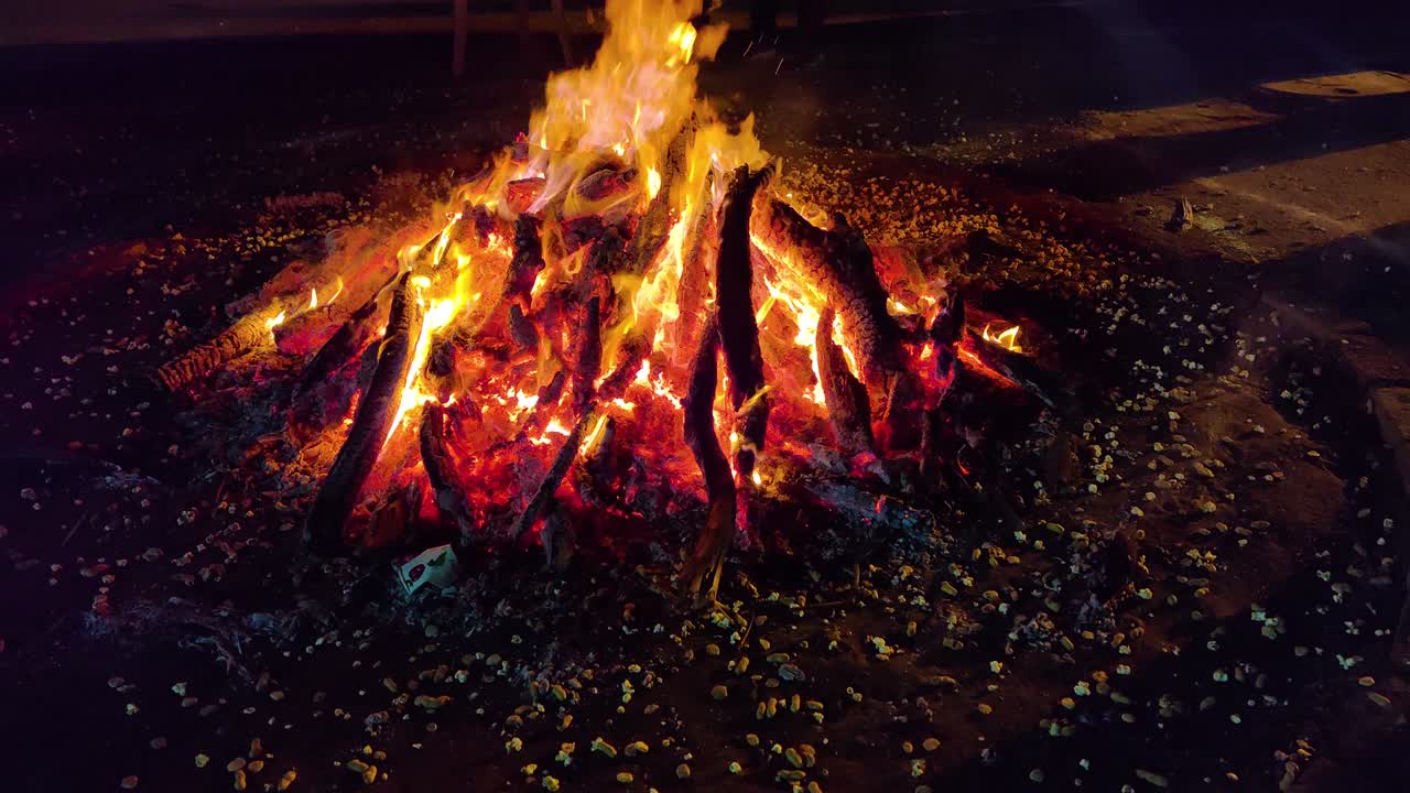 Giant bon fire lit for the festival of Lohri