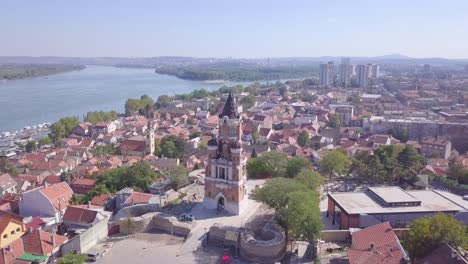 slow fantastic aerial orbiting shot of gardos tower in zemun old city