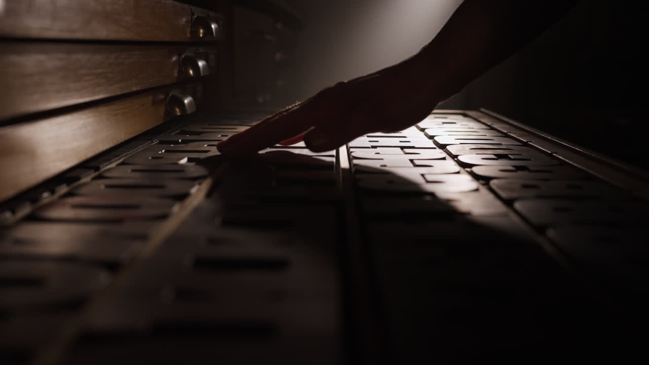 Hand in letterpress type case