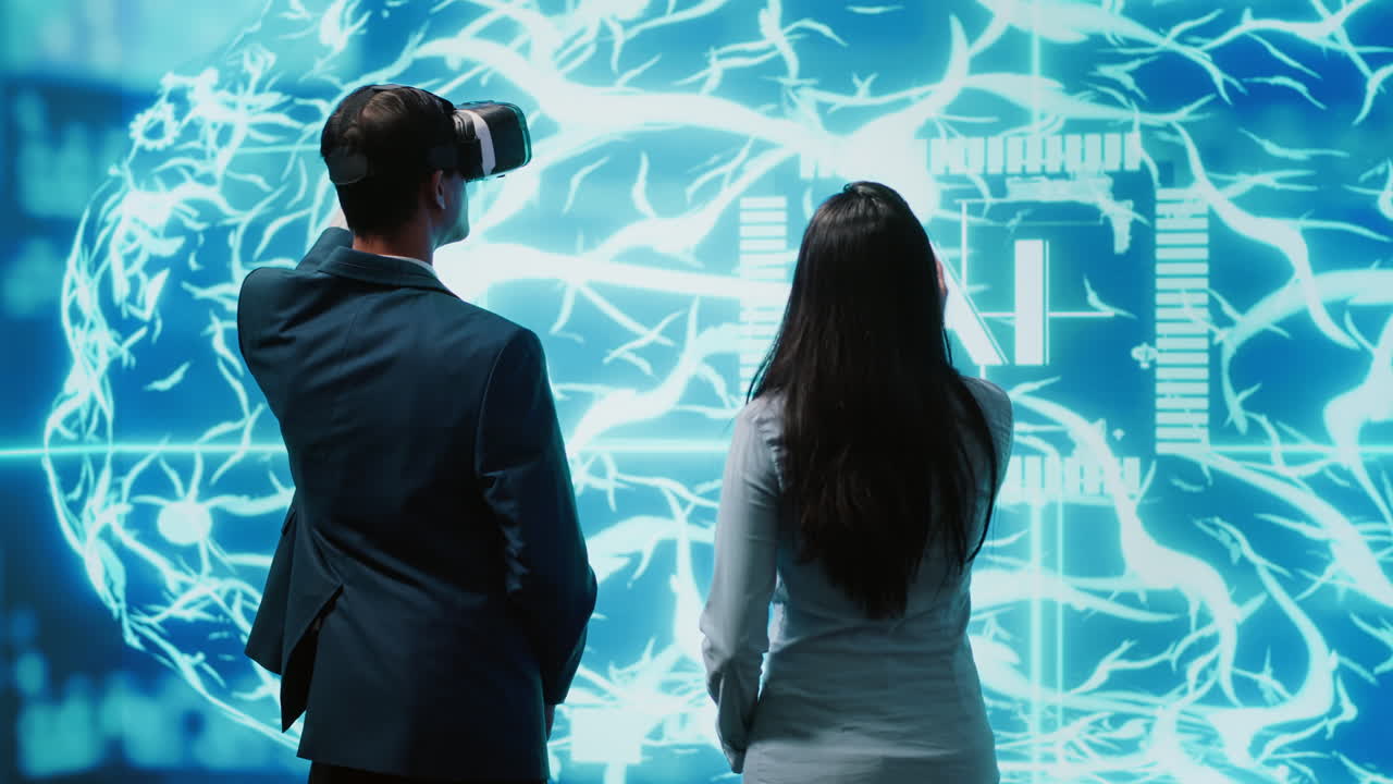 Engineering team wearing VR headset looking at hologram of AI