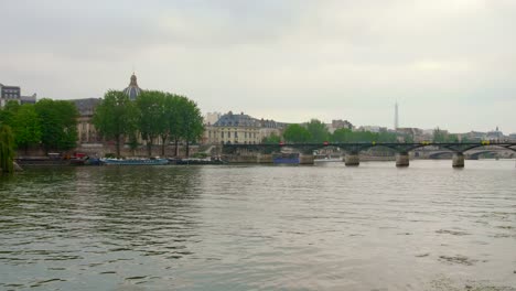 seine river and famous pont des arts in the distance