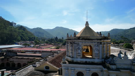 aerial view: iglesia de la merced, antigua guatemala, under blue skies