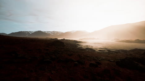 Atmospheric-landscape-with-mountain-lake-among-moraines-in-rainy-weather