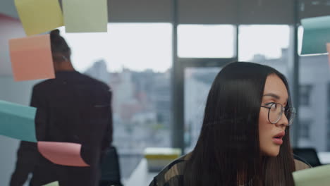 Angry-man-tearing-sticker-at-office-closeup.-Team-arguing-at-strategy-board-room