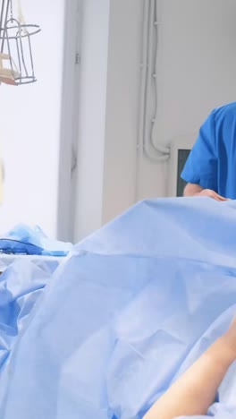 doctor examining a patient in a hospital