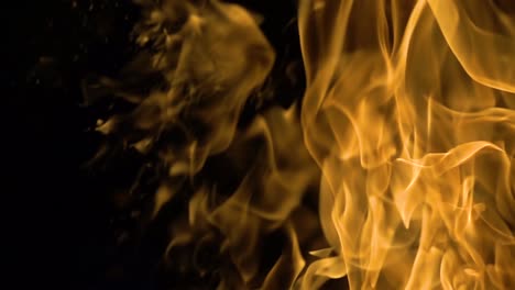 Flames-of-fire-on-black-background-in-slow-motion