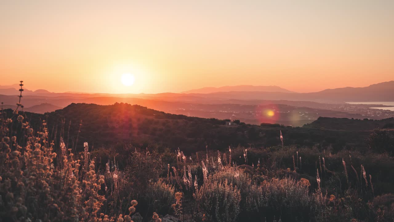 Timelapse from top of the mountain of a beautiful sunset in Crete Greece