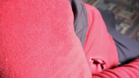 a man, wearing red sports clouds