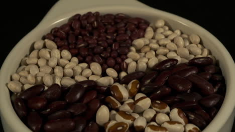 dry kidney, navy, yellow-eyed, adzuki bean bowl rotates in dark room