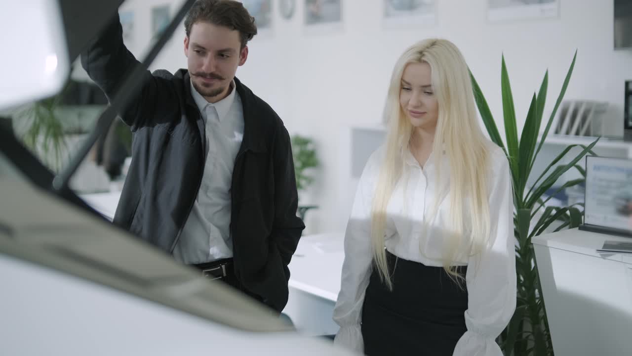 People at a car dealership