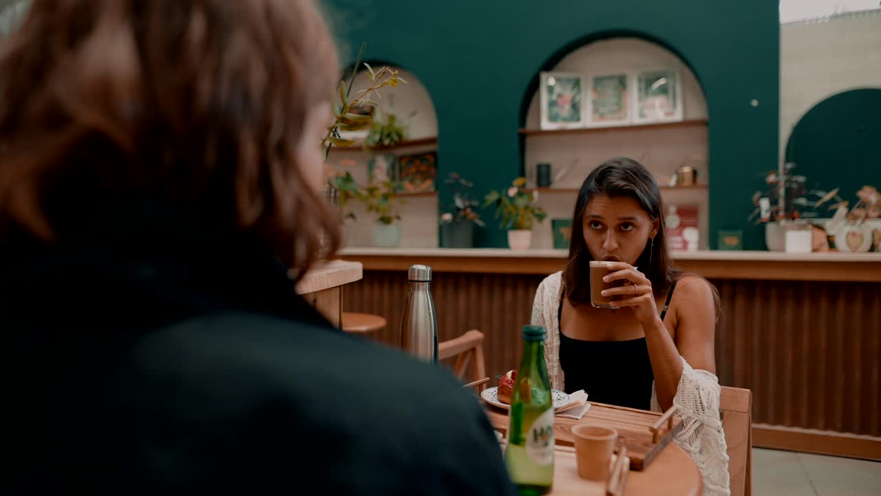 People having coffee in a cafe