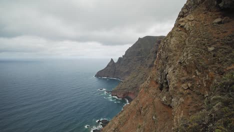 panoramic view over the atlantic ocean and sea cliffs from anaga mountains with clouds over the sea in the background