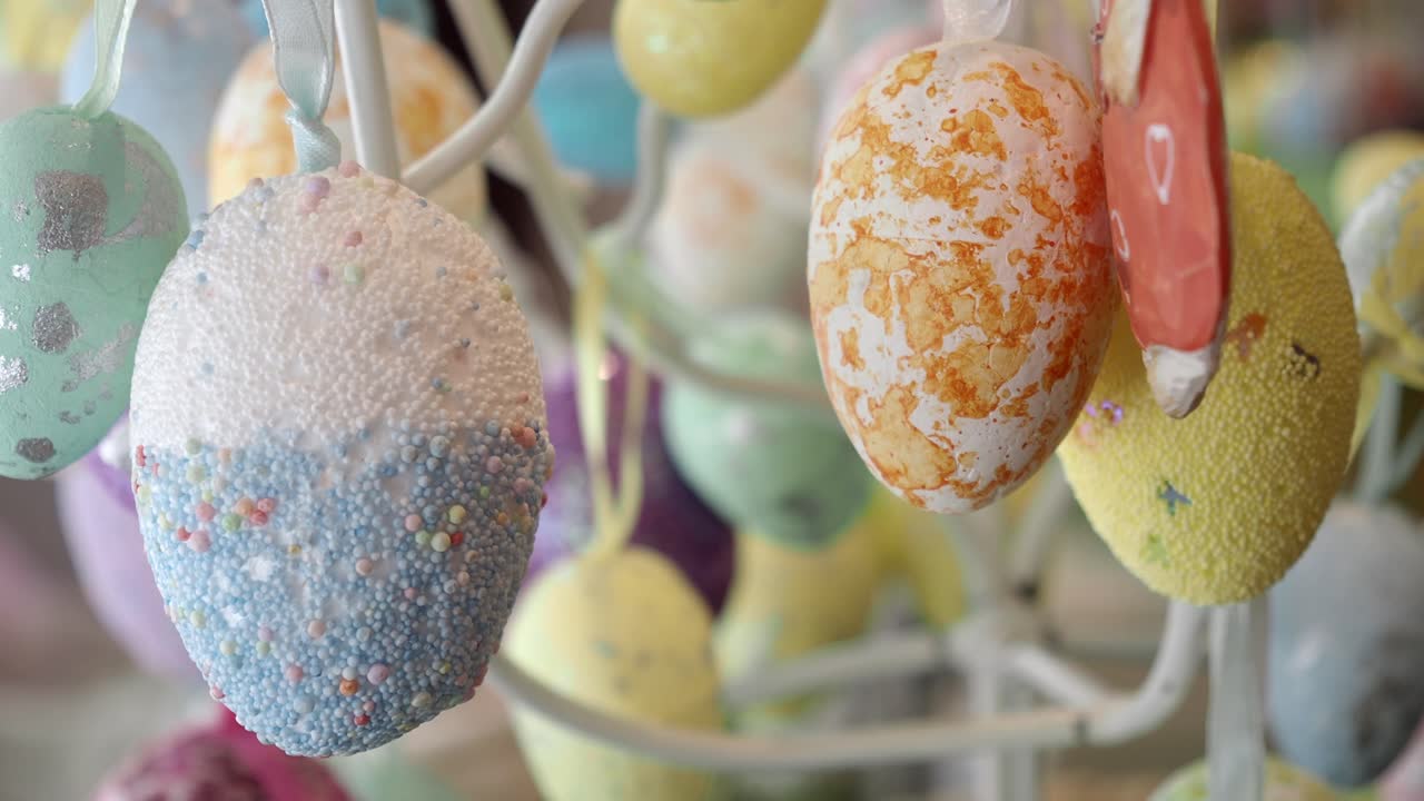 Colorful Easter Eggs Decorated and Hanging on a Tree