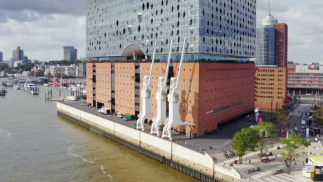 Aerial-view-of-the-port-of-Hamburg-with-Elbphilharmonie-on-a-cloudy-day