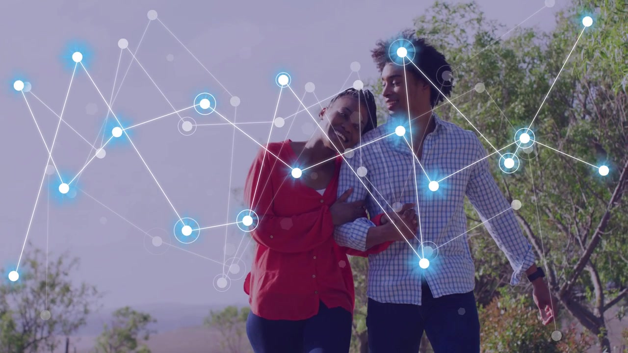 Couple walking linked arms along rural path, nodes fading left, overlapping them, showing tech link