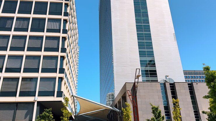 Multi-storied diverse buildings in the urban city. High-rise buildings at the backdrop of blue sky. Bratislava, Slovakia
