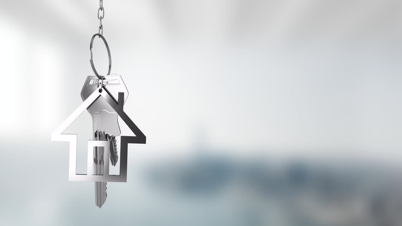 House-shaped keychain with keys animation over blurred background