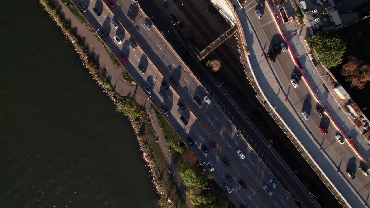 Overhead drone view of NYC's West Side Highway, Riverside Drive and Hudson River, 4K cinematic aerial