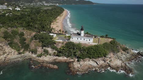 lighthouse on cliff drone aerial