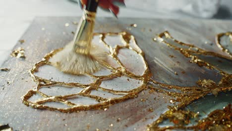gold leaf painting in progress