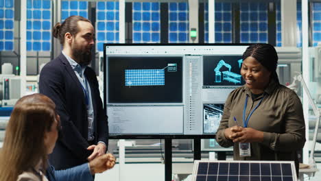 managers in photovoltaics plant office reviewing solar technology reports