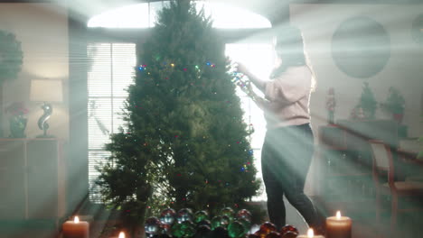 woman decorating a christmas tree in a bright, festive home