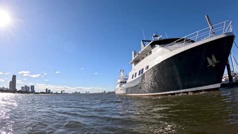 a boat approaches and docks at the pier